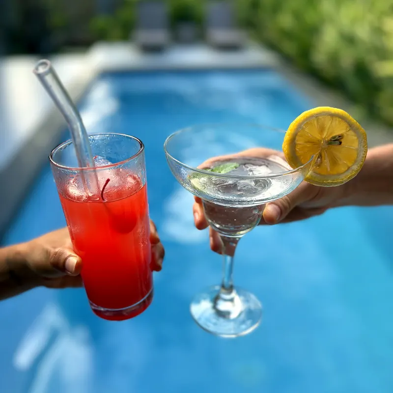 Two cocktails on the pool edge